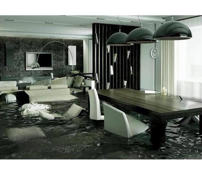 The interior of the house is engulfed in approximately two feet of water in the living and dining rooms.