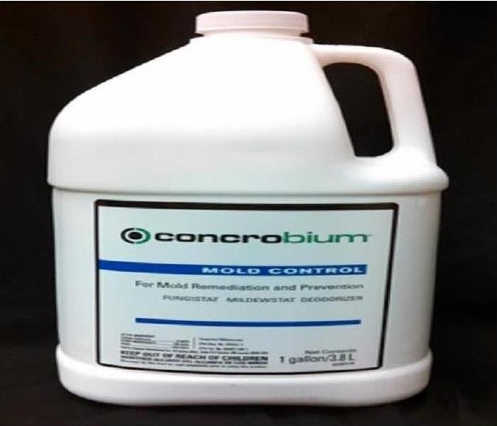 A bottle of the Concrobium Mold Control antimicrobial displays.